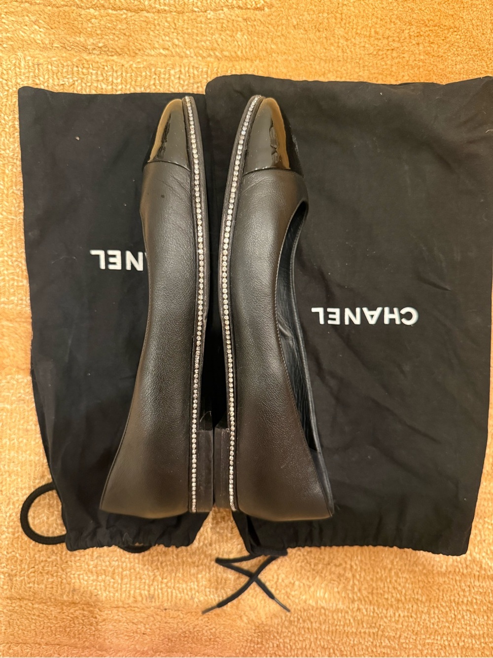 CHANEL Black Leather Cap-Toe Ballet Flats with Crystal-Trim Sole